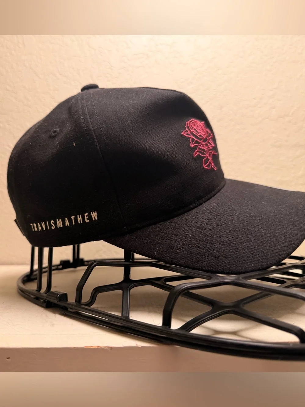 Travis Mathew Black Hat with Pink Rose Embroidery
